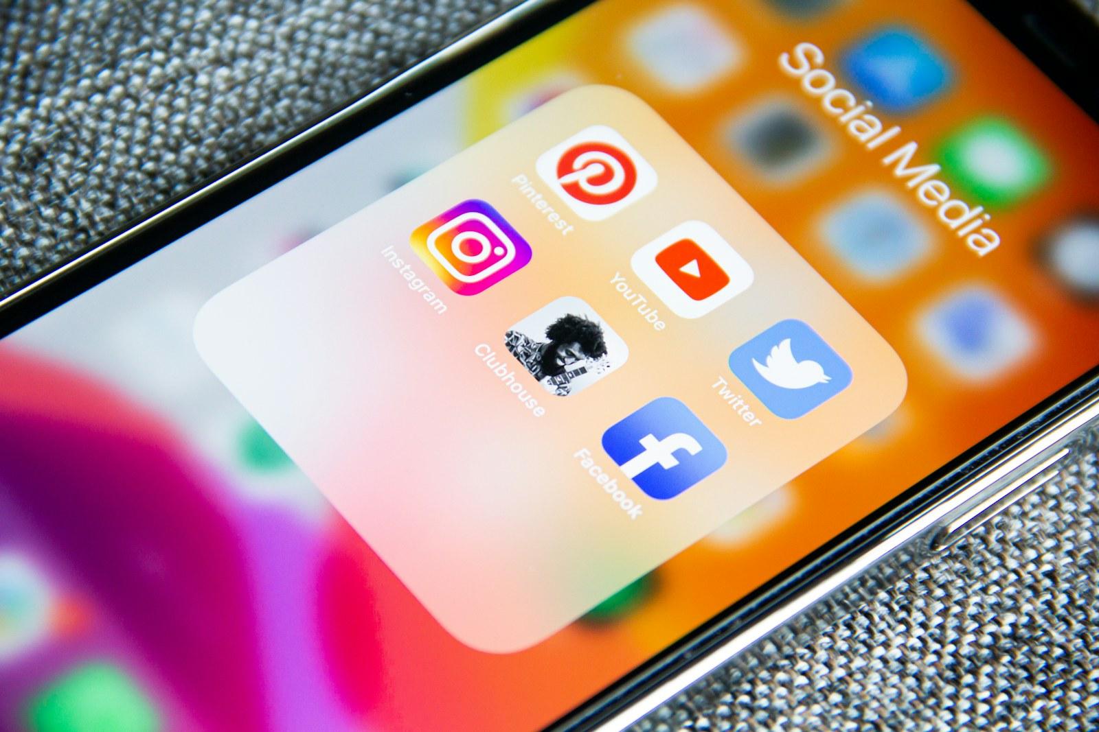 Social media apps on a phone — Adsuitz unifies ad campaigns and marketing automation with AI